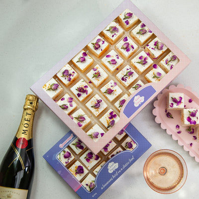24-piece Champagne Gold Marshmallow Party Box by Cloud Theory styled with Moët & Chandon – luxe handcrafted treats for elegant parties and celebrations.