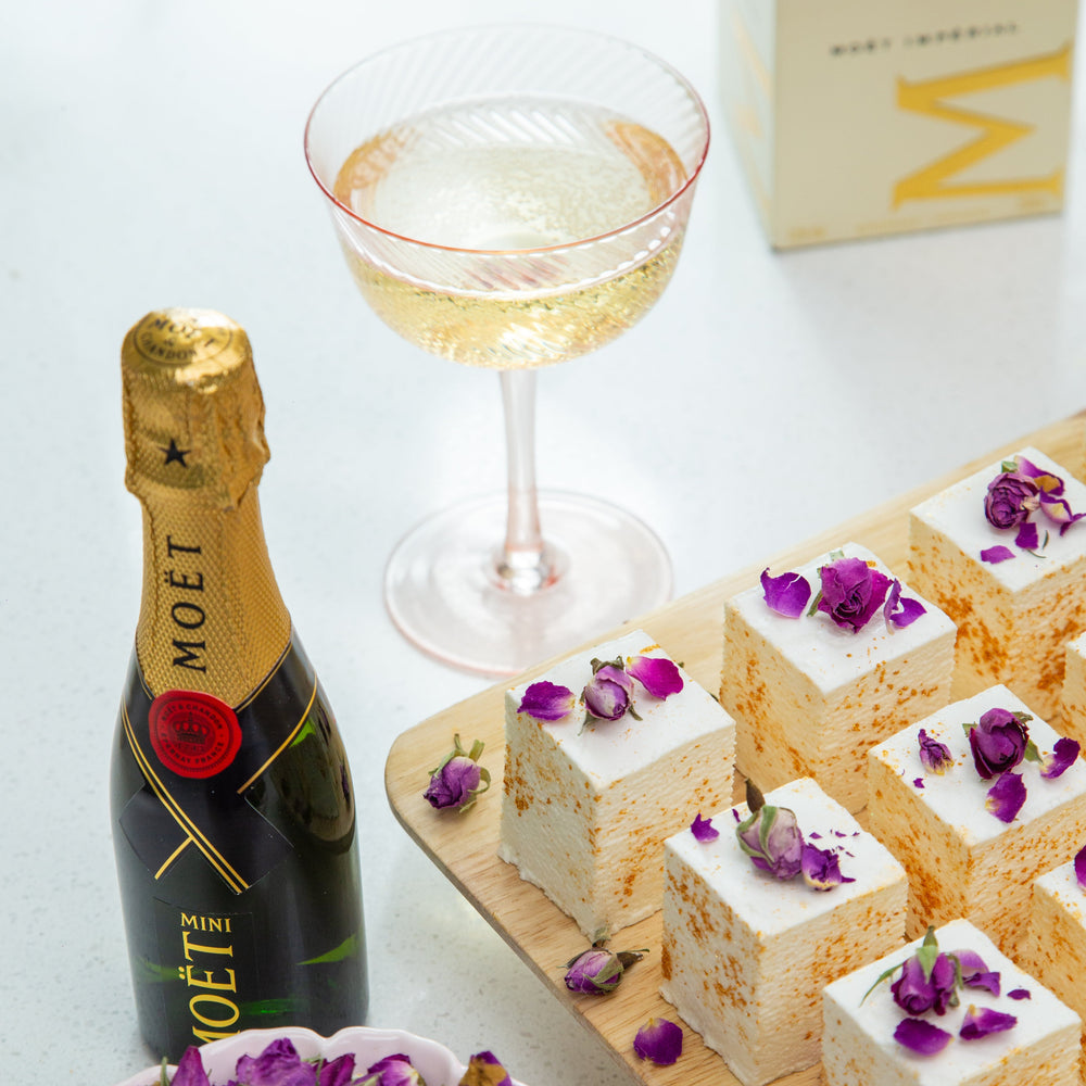 24-piece Champagne Gold Marshmallow Party Box by Cloud Theory styled with Moët & Chandon – luxe handcrafted treats for elegant parties and celebrations.