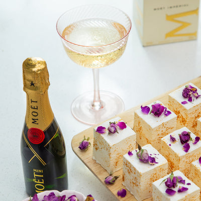 24-piece Champagne Gold Marshmallow Party Box by Cloud Theory styled with Moët & Chandon – luxe handcrafted treats for elegant parties and celebrations.