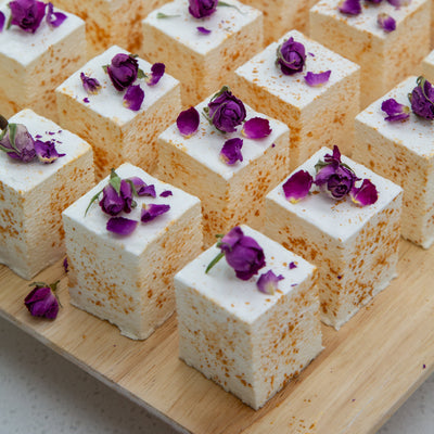 24-piece Champagne Gold Marshmallow Party Box by Cloud Theory styled with Moët & Chandon – luxe handcrafted treats for elegant parties and celebrations.