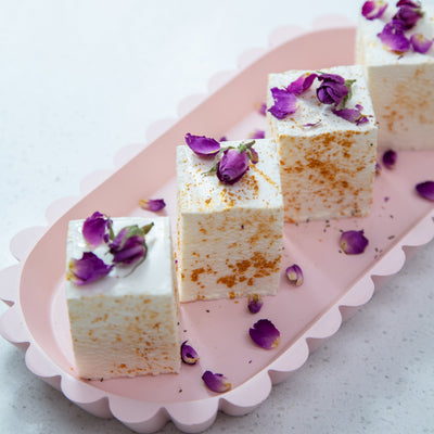 24-piece Champagne Gold Marshmallow Party Box by Cloud Theory styled with Moët & Chandon – luxe handcrafted treats for elegant parties and celebrations.