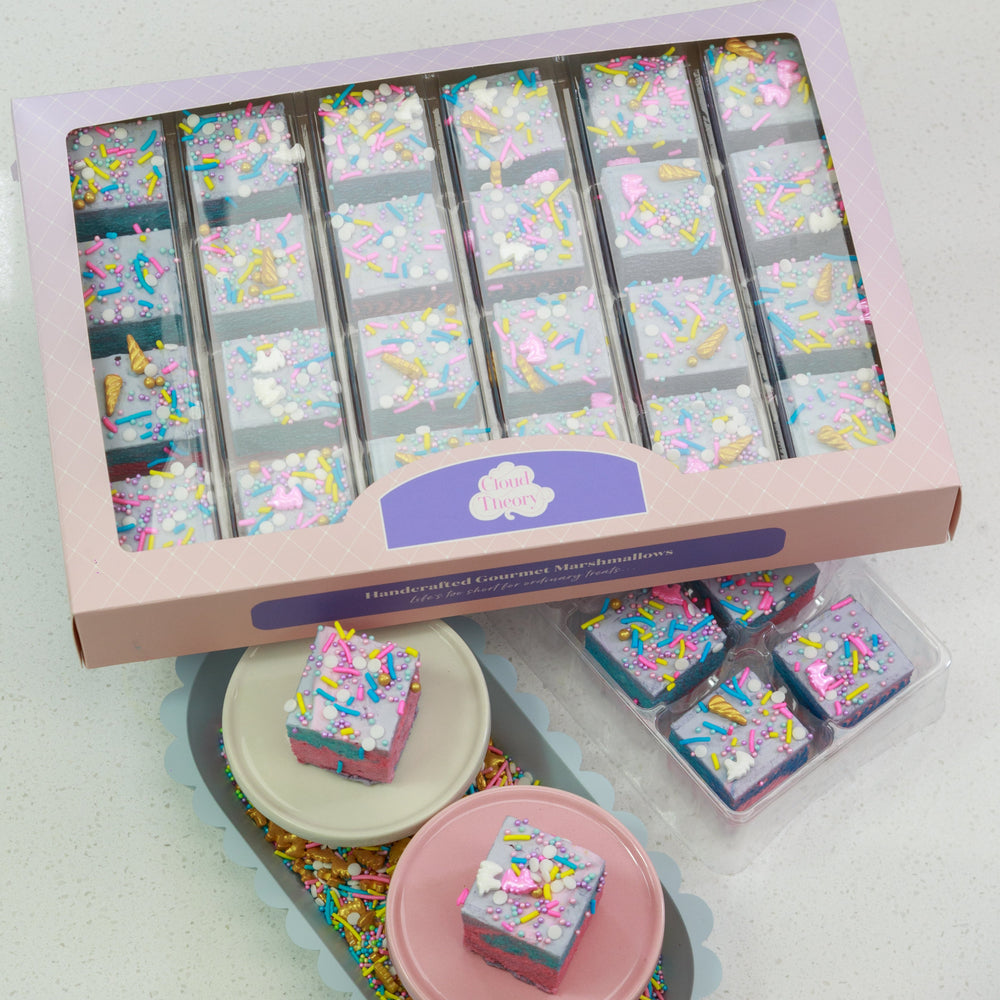 24-piece Rainbow Unicorn marshmallow box featuring pastel-coloured fairy floss marshmallows with whimsical unicorn sprinkles. Perfect for unicorn-themed parties and magical birthday celebrations.
