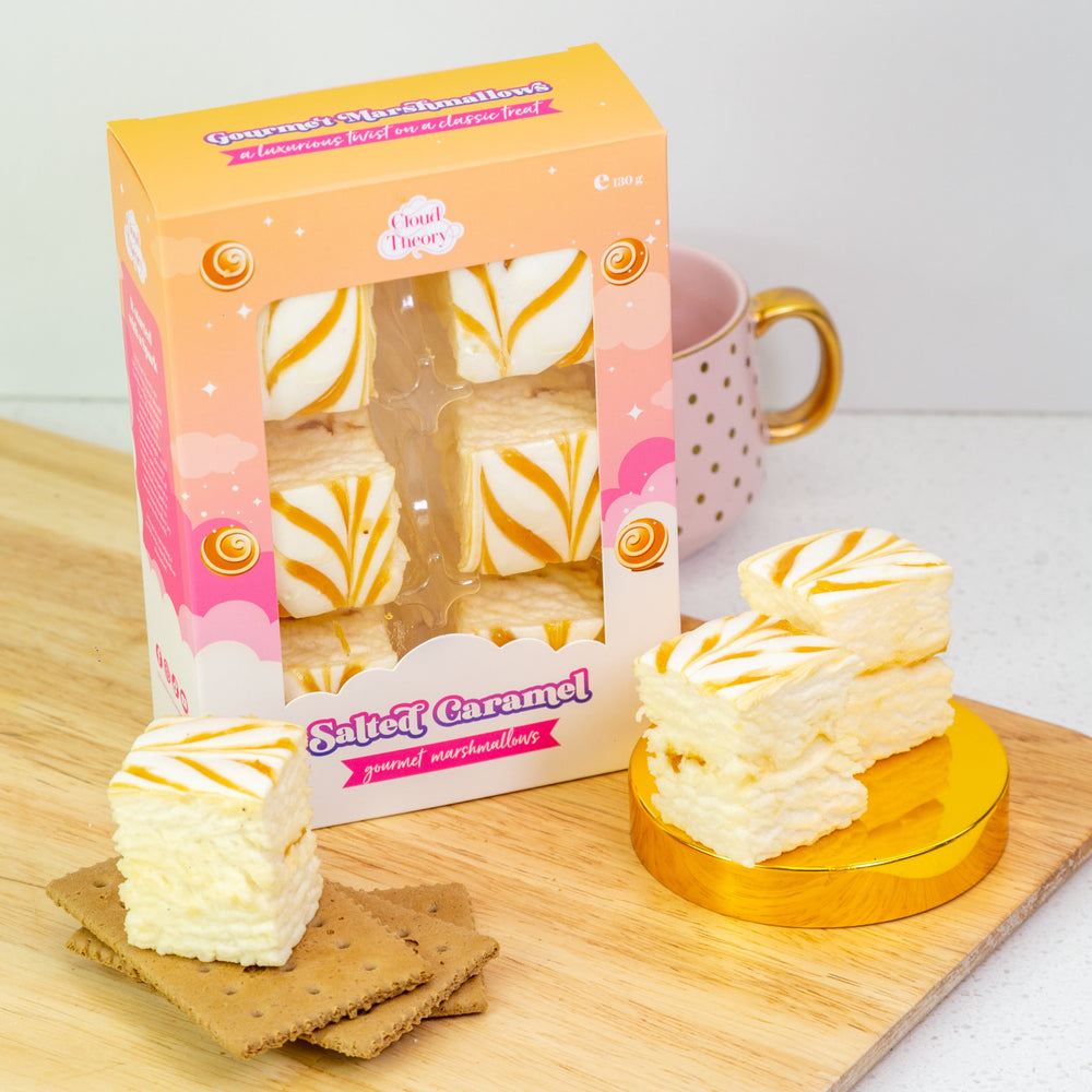 Salted Caramel treats with packaging on a wooden board